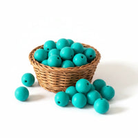perle ronde en silicone 12 mm de couleur vert turquoise