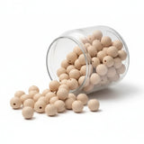 perle ronde silicone beige 12 mm dans un verre transparent