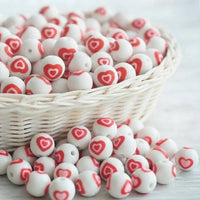 perle silicone 12 mm double coeur rouge fournisseur perle  attache tetine 