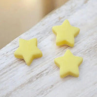 perle en silicone étoile jaune clair en 12 mm