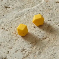 perle hexagonal silicone jaune 17mm