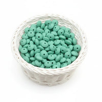 utiliser vos perles plates en silicone de couleur menthe 12 mm dans vos créations 