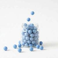 perle ronde de 12mm en silicone couleur bleu gris clair pour création attache tetine 