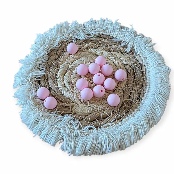 perle silicone en perle ronde 12 mm en couleur rose clair