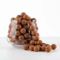 perle en silicone ronde en 12 mm de couleur caramel