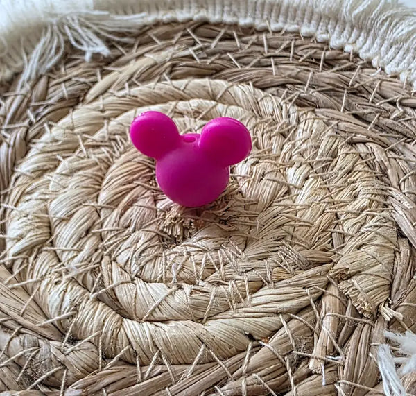perle en silicone forme tête disney en couleur fushia