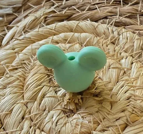 perle en silicone en forme tete mickey en couleur menthe