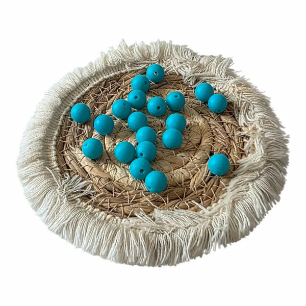 perle en silicone 12 mm de couleur turquoise 