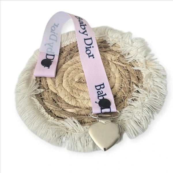 attache tétine en baby dior rose en ruban gros grain