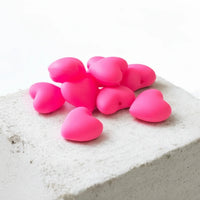 perle en silicone de couleur rose flashy