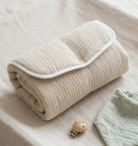 tapis a langer nomade creme
