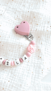 vidéo attache tetine clip silicone rose et vieux rose