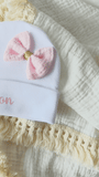 vidéo présentant une bonnet bebe naissance noeud rose 